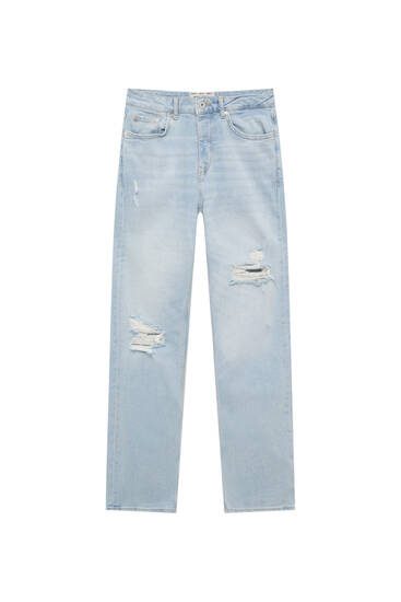 Jeans slim fit dettaglio di strappi