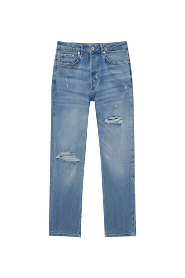 Jeans slim fit detalle rotos