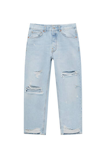 Jeansy standardowe z przetarciami