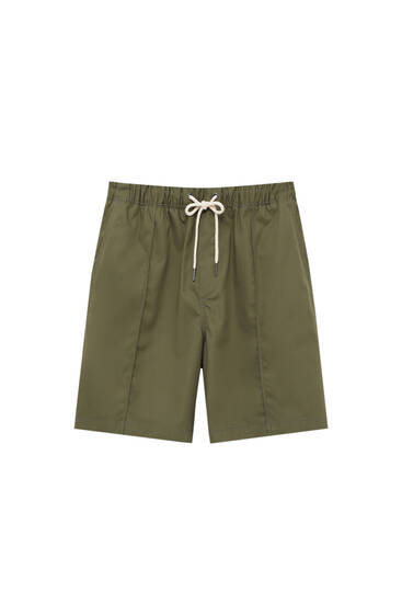 Bermuda shorts with elastic waistband and seam detail