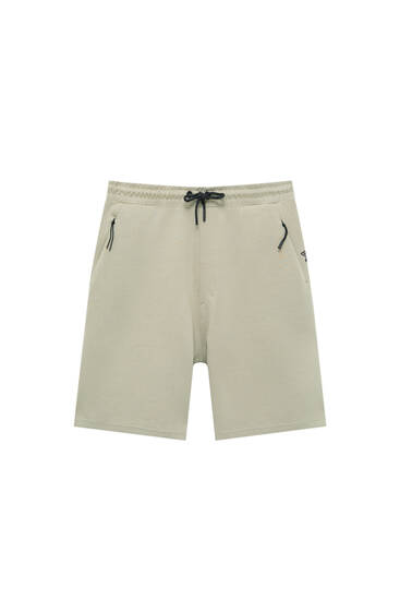 Jogging Bermuda shorts with zip pockets 