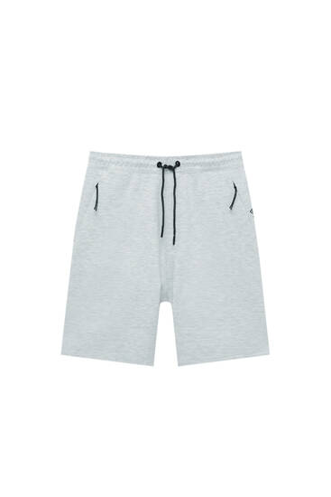 Jogging Bermuda shorts with zip pockets