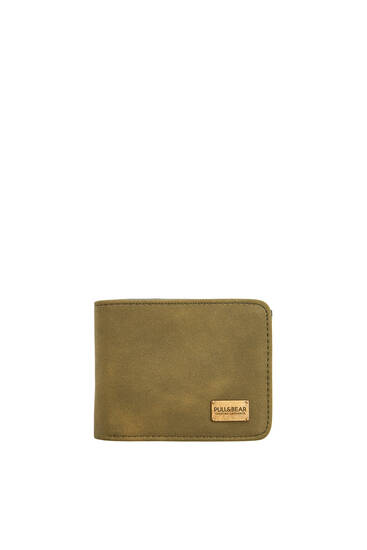 Faux suede wallet with plaque and logo
