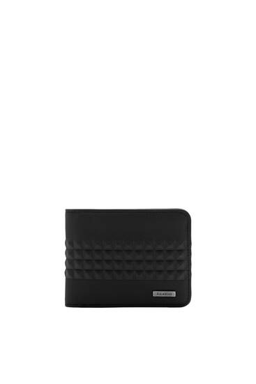 Black wallet with raised design