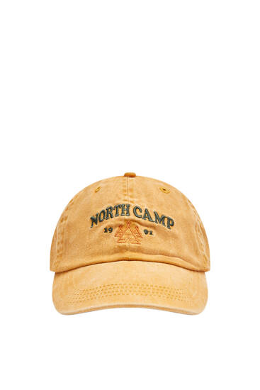 Peak cap with North Camp slogan