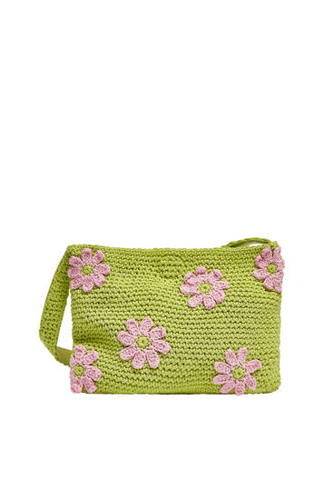 Crochet shoulder bag with embroidered daisies