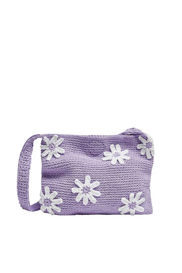 Crochet shoulder bag with embroidered daisies