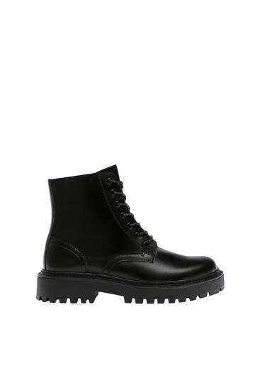 Lace-up boots with track sole