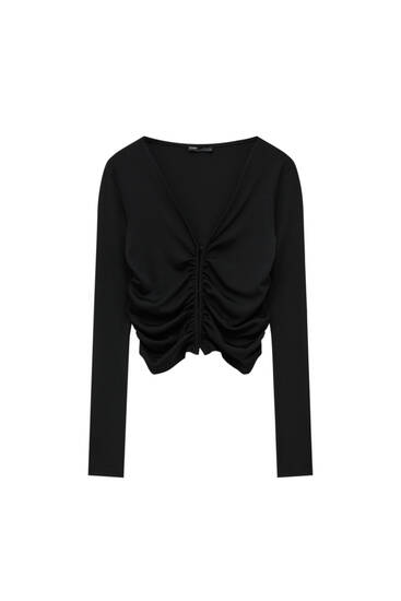 Long sleeve top with front fastening