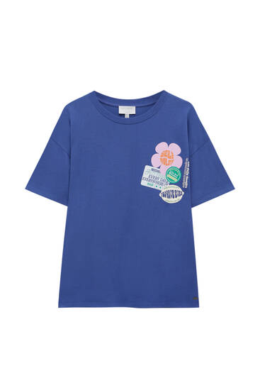 Μπλούζα με graphic τύπωμα με λουλούδι