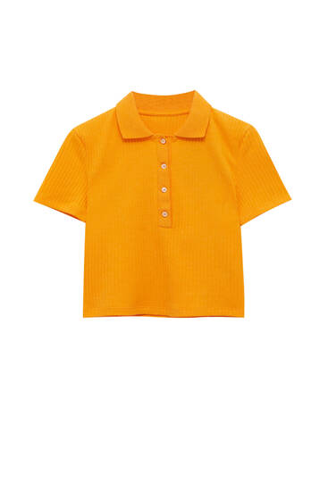 قميص بولو برتقالي بأكمام قصيرة