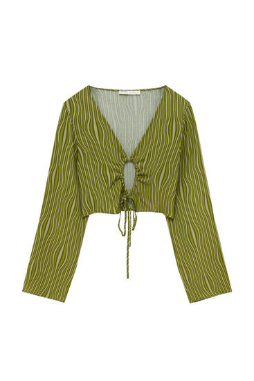 Striped blouse with cut-out neckline