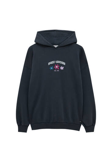 Oversize hoodie with flowers on the back