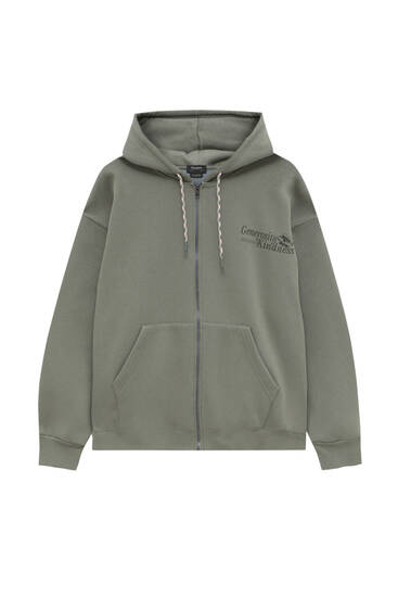 green and blue sweatshirt