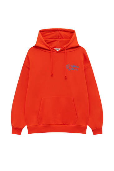 Red hoodie with tennis embroidery