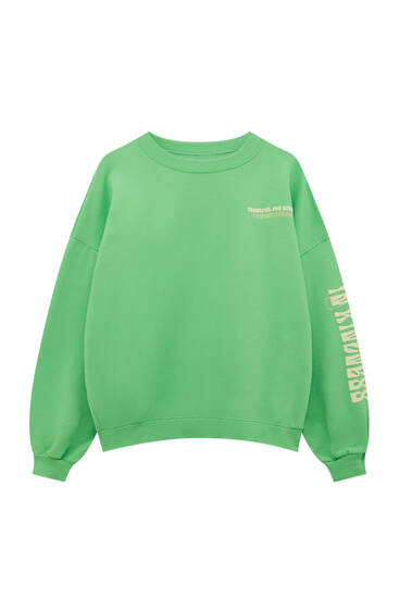 green sweat shirt