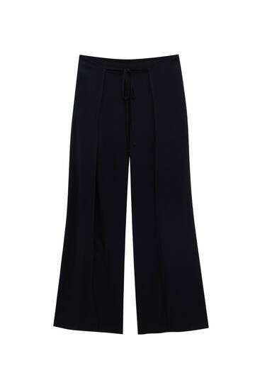 Pantalón efecto vinilo azul marino - PULL\u0026BEAR