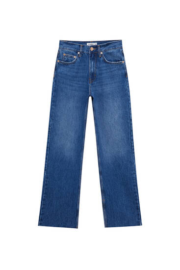 Zvonové džíny s vysokým pasem a detailem rozparku