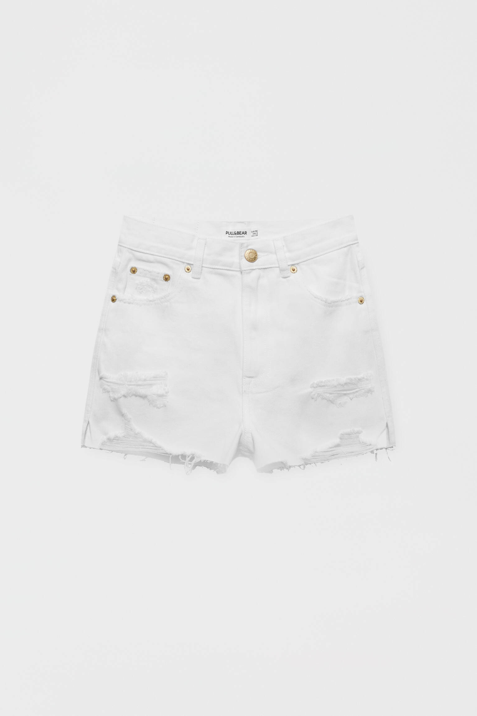 shorts de mezclilla rotos