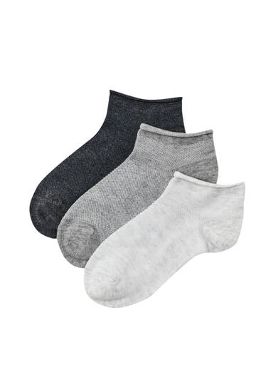 Balení ohrnutých ponožek