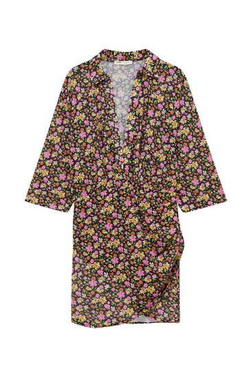 Short floral dress with flowing sleeves