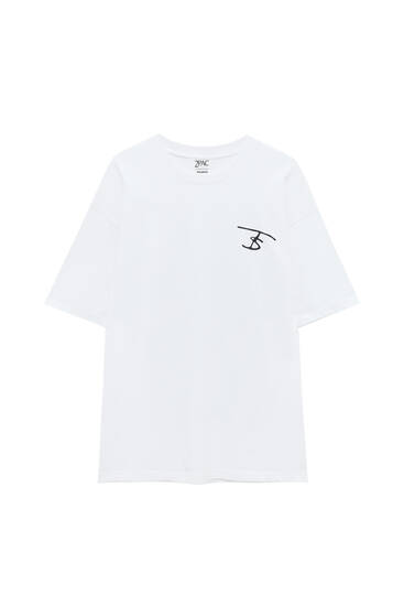Biała koszulka z napisami i Tupakiem
