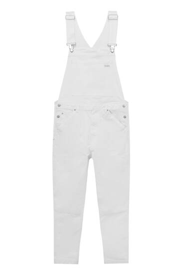 Long white dungarees
