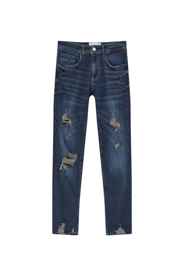 Úzké džíny prémium s detaily žebrování
