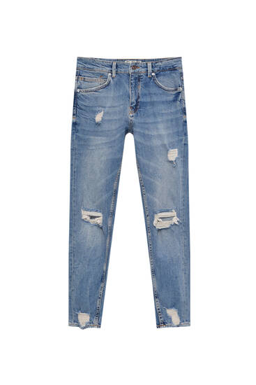 Jeans carrot fit tejido premium detalle rotos