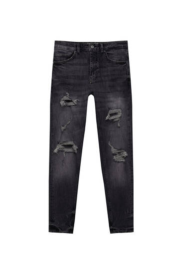 Premium carrot fit jeans with ripped detailing