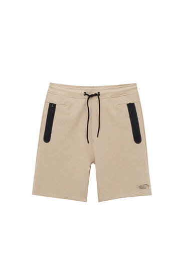 Jogger fit Bermuda shorts with contrast pockets