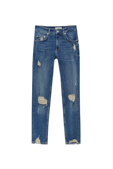 Úzké džíny z prémiové látky s detailem roztrhání