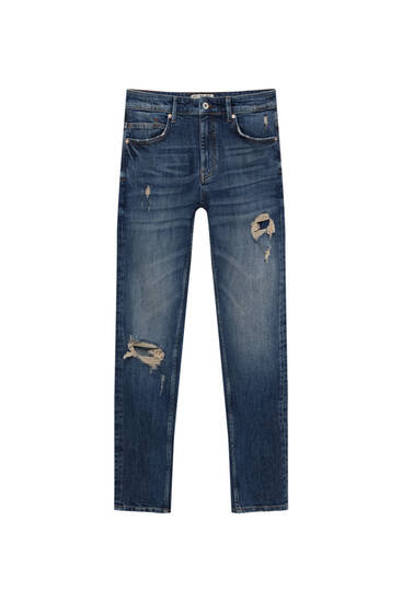 Jeans carrot fit strappati