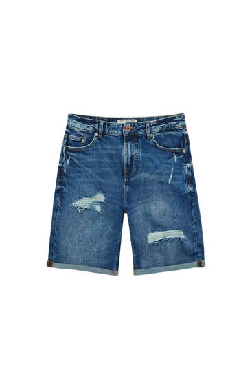 Dark blue denim slim fit Bermuda shorts with ripped detail