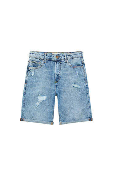 Medium blue denim slim fit Bermuda shorts with ripped detail
