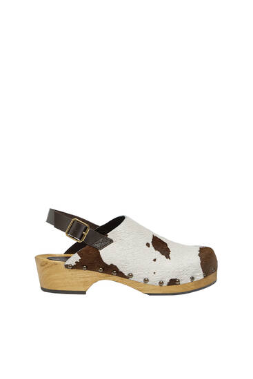 Cowhide print leather clogs