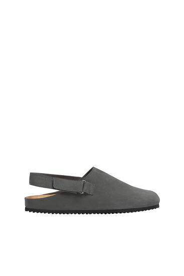 Leather clogs with ankle strap detail