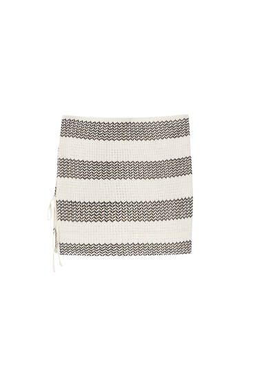 Striped knit mini skirt with slit