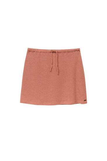 Orange openwork mini skirt