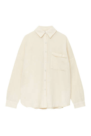 Rustic oversize shirt with frayed-trim pocket