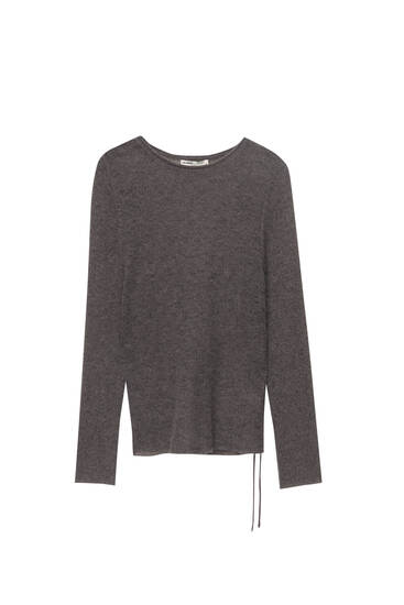 Fine knit jumper with side gathering