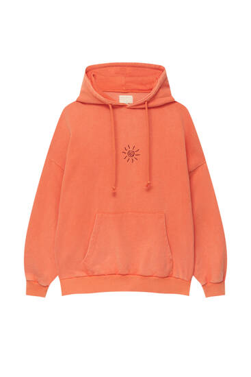 Sudadera naranja bordado sol PULL BEAR