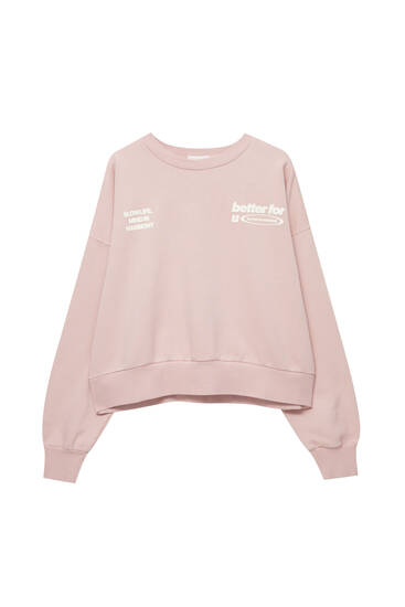 Pink sweatshirt with slogan