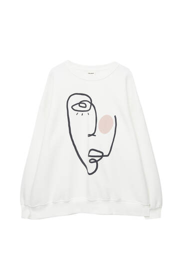 White sweatshirt with face graphic