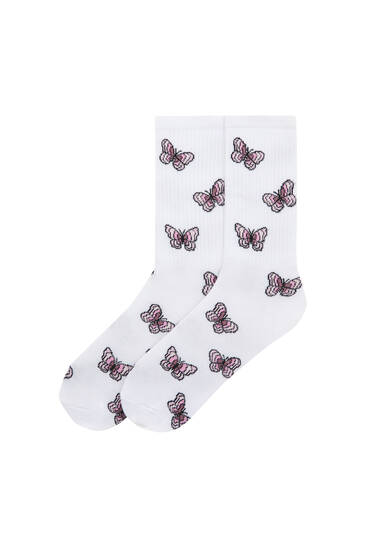 Chaussettes sport à imprimé papillons all over
