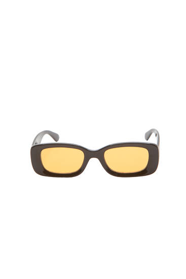 Rechteckige Sonnenbrille mit orangefarbenen Gläsern