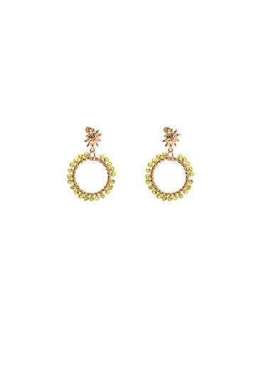 Sun earrings with green beads