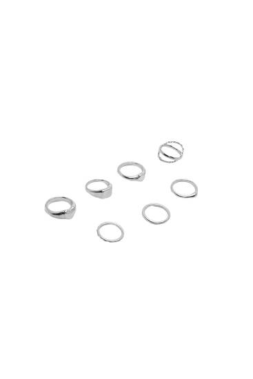 Pack of 7 rings with a metallic finish
