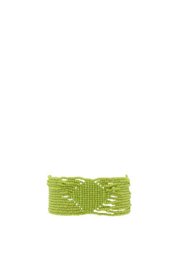 Wide bracelet with green beads