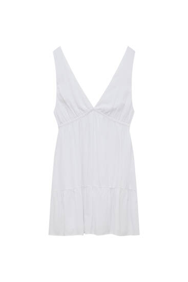 שמלה קצרה בצבע לבן עם כתפיות דקות